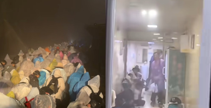 “十一”泰山突遇降雨 厕所挤满过夜游客