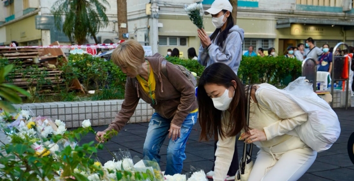 香港大火遇难者头七 儿忆母亲遗言泪奔