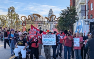 華埠金龍大遊行喜慶中 基層租戶籲勿漲租