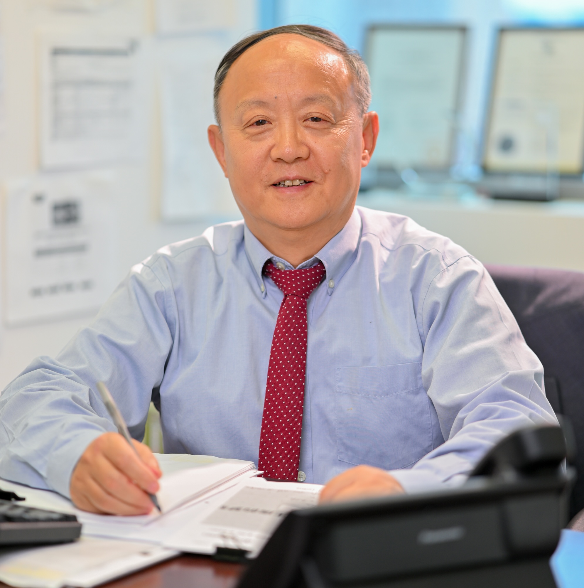 新美貸款銀行總裁陳名岷。(宏達/大紀元)